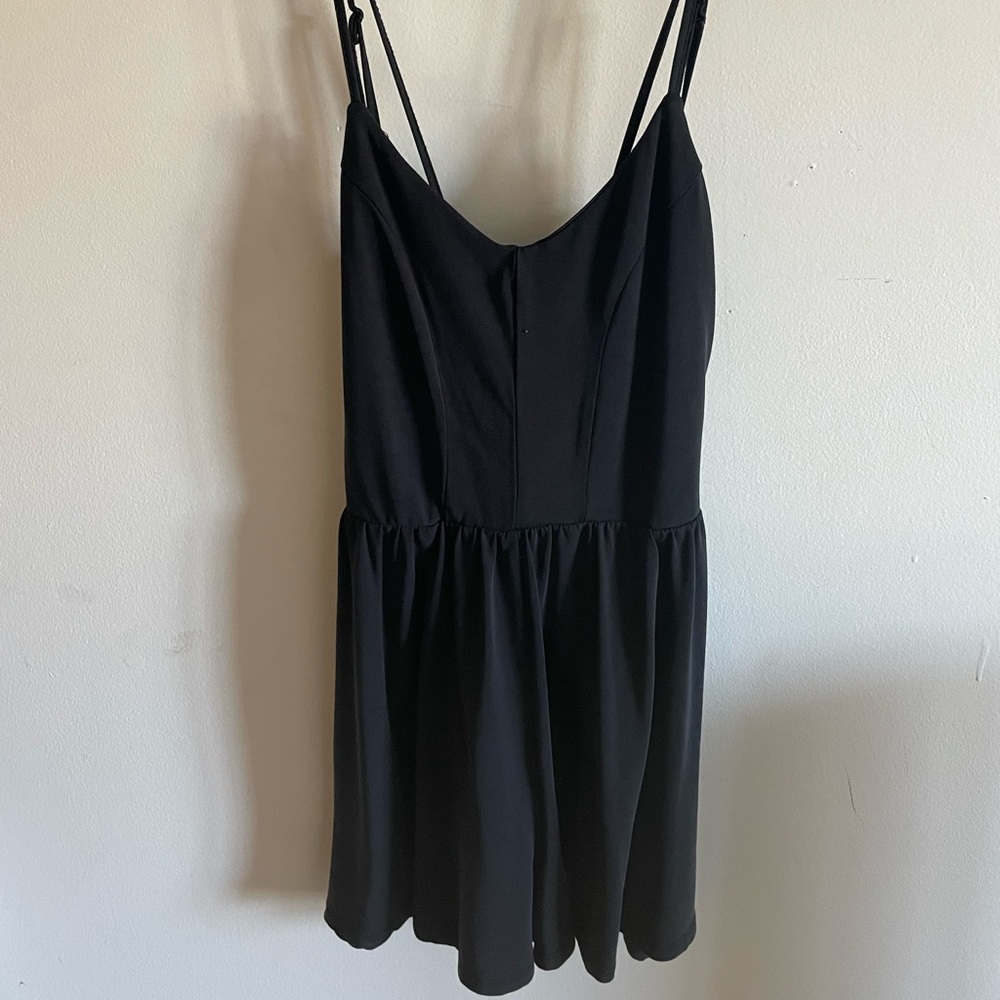 Black strappy/backless romper